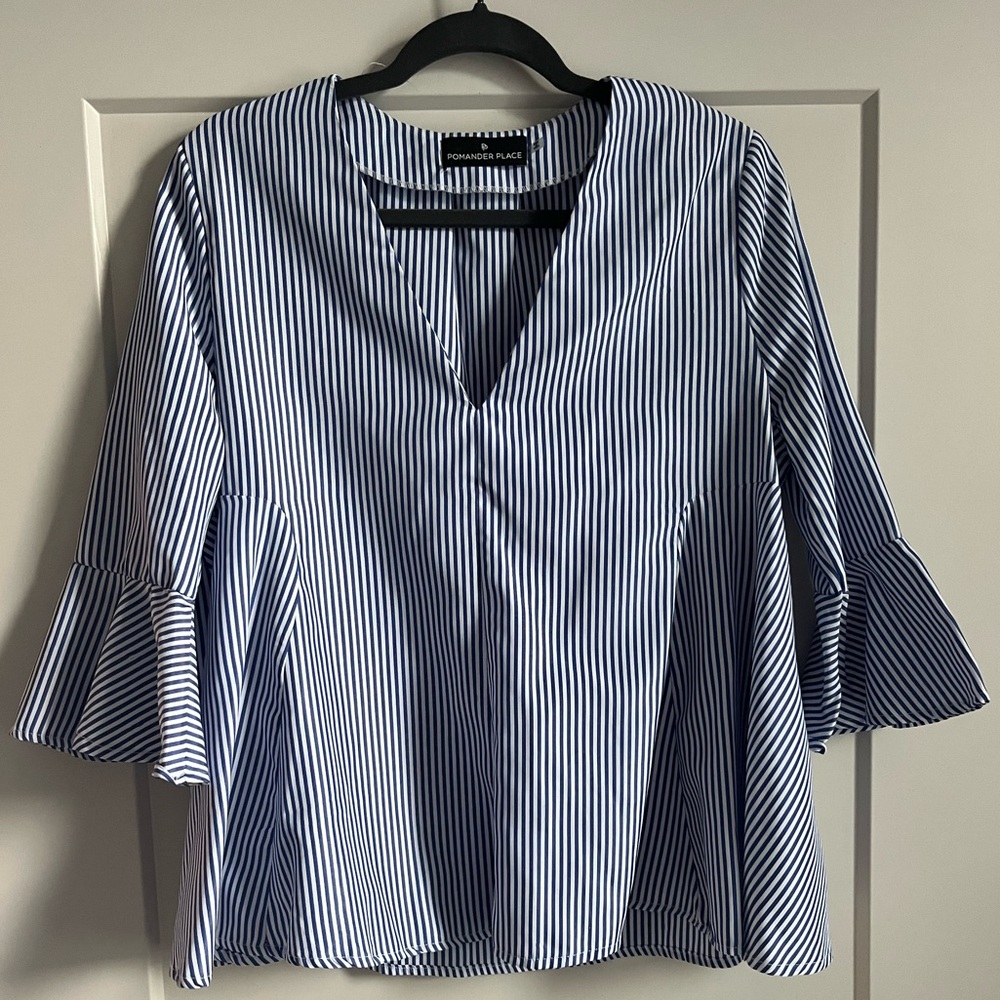 White and royal blue blouse.